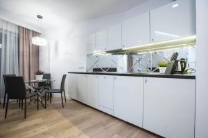 Kuchyňa alebo kuchynka v ubytovaní Glamour Centrum
