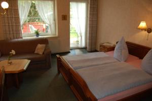 Postel nebo postele na pokoji v ubytování Wieting´s Hotel