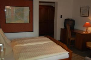 Postel nebo postele na pokoji v ubytování Wieting´s Hotel