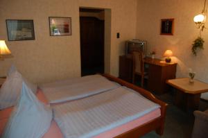 Postel nebo postele na pokoji v ubytování Wieting´s Hotel