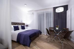 Posteľ alebo postele v izbe v ubytovaní Glamour Centrum