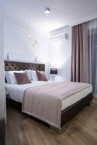 Posteľ alebo postele v izbe v ubytovaní Glamour Centrum