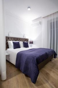 Posteľ alebo postele v izbe v ubytovaní Glamour Centrum