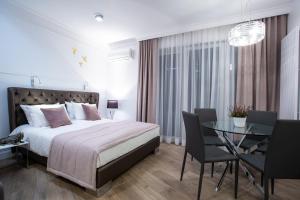 Posteľ alebo postele v izbe v ubytovaní Glamour Centrum