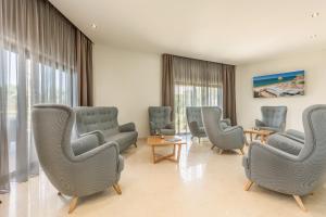 Гостиная зона в Caneiros Luxury House & Suites