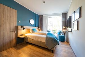 Postel nebo postele na pokoji v ubytování HARBR. hotel Konstanz