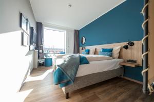 Postel nebo postele na pokoji v ubytování HARBR. hotel Konstanz
