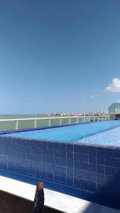 FLAt COMPLETO BEIRA MAR tesisinde veya buraya yakın yüzme havuzu