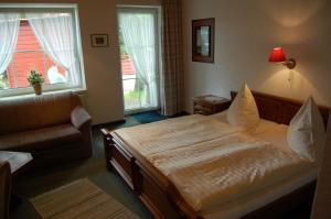 Postel nebo postele na pokoji v ubytování Wieting´s Hotel + 32 fotografií