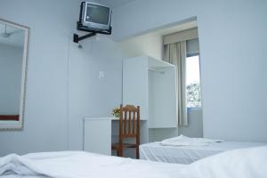 Ένα ή περισσότερα κρεβάτια σε δωμάτιο στο Ok Inn Hotel Express