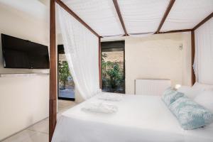 Posteľ alebo postele v izbe v ubytovaní Villa Emilia front sea + 37 fotografií