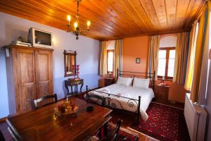 Postel nebo postele na pokoji v ubytování Hotel Machalas