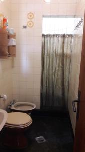 Koupelna v ubytování Homero y Martín Coronado