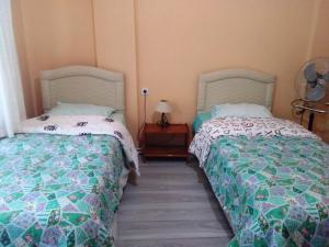 Postel nebo postele na pokoji v ubytování Bahar Pansiyon