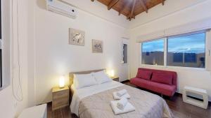 Posteľ alebo postele v izbe v ubytovaní Meliades Villas
