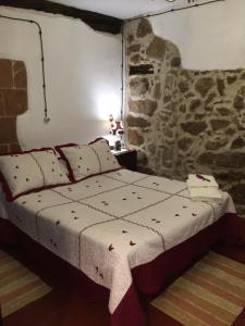 Postel nebo postele na pokoji v ubytování Tu Casa de Pueblo