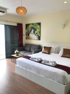 Postel nebo postele na pokoji v ubytování DB Residence
