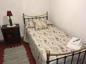 Posteľ alebo postele v izbe v ubytovaní Tu Casa de Pueblo