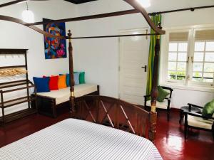 Llit o llits en una habitació de Gammaduwa Bungalow