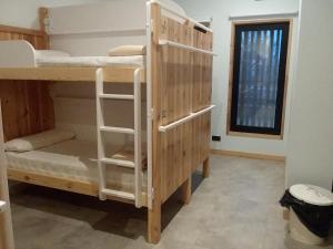 Postel nebo postele na pokoji v ubytování Albergue Milladoiro
