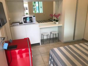 Η κουζίνα ή μικρή κουζίνα στο Pousada Flat Hotel em Casa Forte