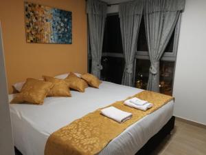 Postel nebo postele na pokoji v ubytování Hotel Anzea