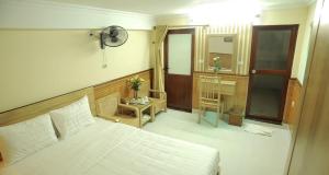 Giường trong phòng chung tại Hoang Giang Homestay