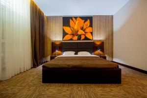 Кровать или кровати в номере AZPETROL HOTEL MINGECHAUR