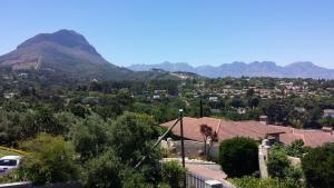 a view of a town with a mountain in the background at 29 Carissa Street in Somerset West