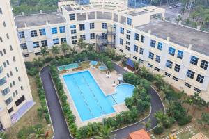 Haikou Meilan·Hainan Univeristy· Locals Apartment 00138360 부지 내 또는 인근 수영장 전경