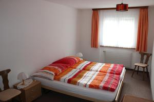 Postel nebo postele na pokoji v ubytování Haus Amara