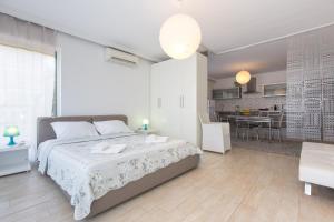 Postel nebo postele na pokoji v ubytování Apartments & rooms DDD2
