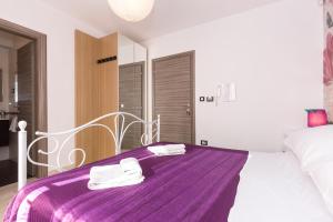 Postel nebo postele na pokoji v ubytování Apartments & rooms DDD2
