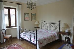 Postel nebo postele na pokoji v ubytování VILLA LE ROSE