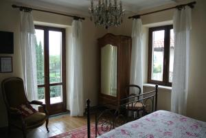 Łóżko lub łóżka w pokoju w obiekcie VILLA LE ROSE