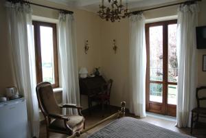Telewizja i/lub zestaw kina domowego w obiekcie VILLA LE ROSE