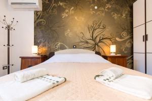 Postel nebo postele na pokoji v ubytování Apartments & rooms DDD2