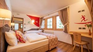 Postel nebo postele na pokoji v ubytování Chalet Snowflake