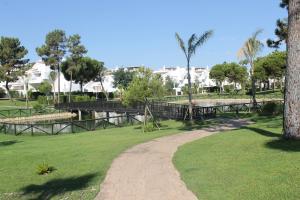 Vonkajšia záhrada v ubytovaní Apartamento en Urbanizacion Hacienda Golf Islantilla