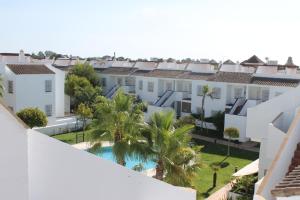 Bazén v ubytovaní Apartamento en Urbanizacion Hacienda Golf Islantilla alebo v jeho blízkosti