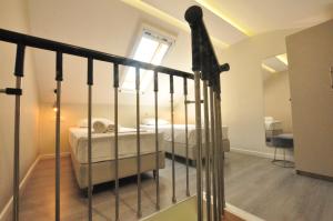 a bedroom with a bed and a window at Tassos Apartments in Acharavi