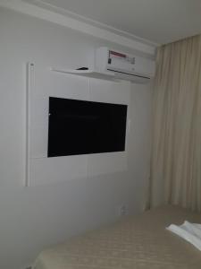 TV i/ili multimedijalni sistem u objektu Le Bon Vivant Residential