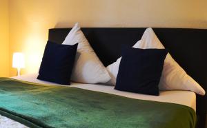 Postel nebo postele na pokoji v ubytování Hotel Athos