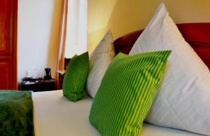 Postel nebo postele na pokoji v ubytování Hotel Athos