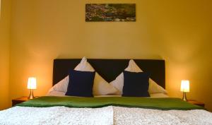 Postel nebo postele na pokoji v ubytování Hotel Athos