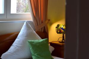 Postel nebo postele na pokoji v ubytování Hotel Athos