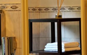 Koupelna v ubytování Hotel Athos