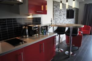 Kuchyňa alebo kuchynka v ubytovaní Apartament Onyx