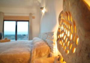 Posteľ alebo postele v izbe v ubytovaní Tindaya Nature Home Ocean View
