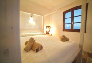 Posteľ alebo postele v izbe v ubytovaní Tindaya Nature Home Ocean View